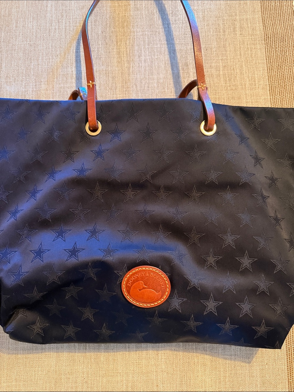 Dooney & Bourke Navy Star-Embossed Tote with Brown Leather Handles